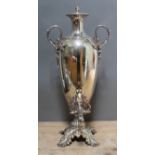 A large silver plated tea urn, twin handled, bright cut engraved ovoid body, acanthus spout with