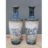 A pair of Doulton Lambeth vases by Hannah Barlow, incised decoration depicting cattle, impressed and