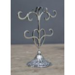 A late Victorian Art Nouveau style silver ring tree, sponsor's indistinctly, probably Levi &