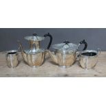 An Edwardian four piece silver tea set, Roberts & Belk, ebony handles and finials, Sheffield