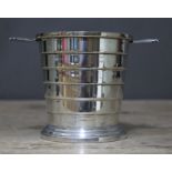 An Art Deco silver plated bottle coaster, height 11.5cm.