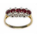 A ruby and diamond cluster ring, hallmarked 18ct gold, sponsor 'B&S', Birmingham 1989, gross wt. 3.