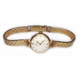 A ladies 9ct gold Rotary wristwatch with hallmarked 9ct brick link strap, gross wt. 18.8g.
