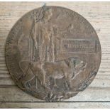 A WW1 death plaque, 351772 PTE. William Barnes Manchester Regiment, died in action on 4th of October