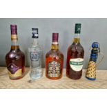 Five bottles of spirits; Chivas Regal 12 year old whiskey, Three Barrels brandy, Courvoisier brandy,