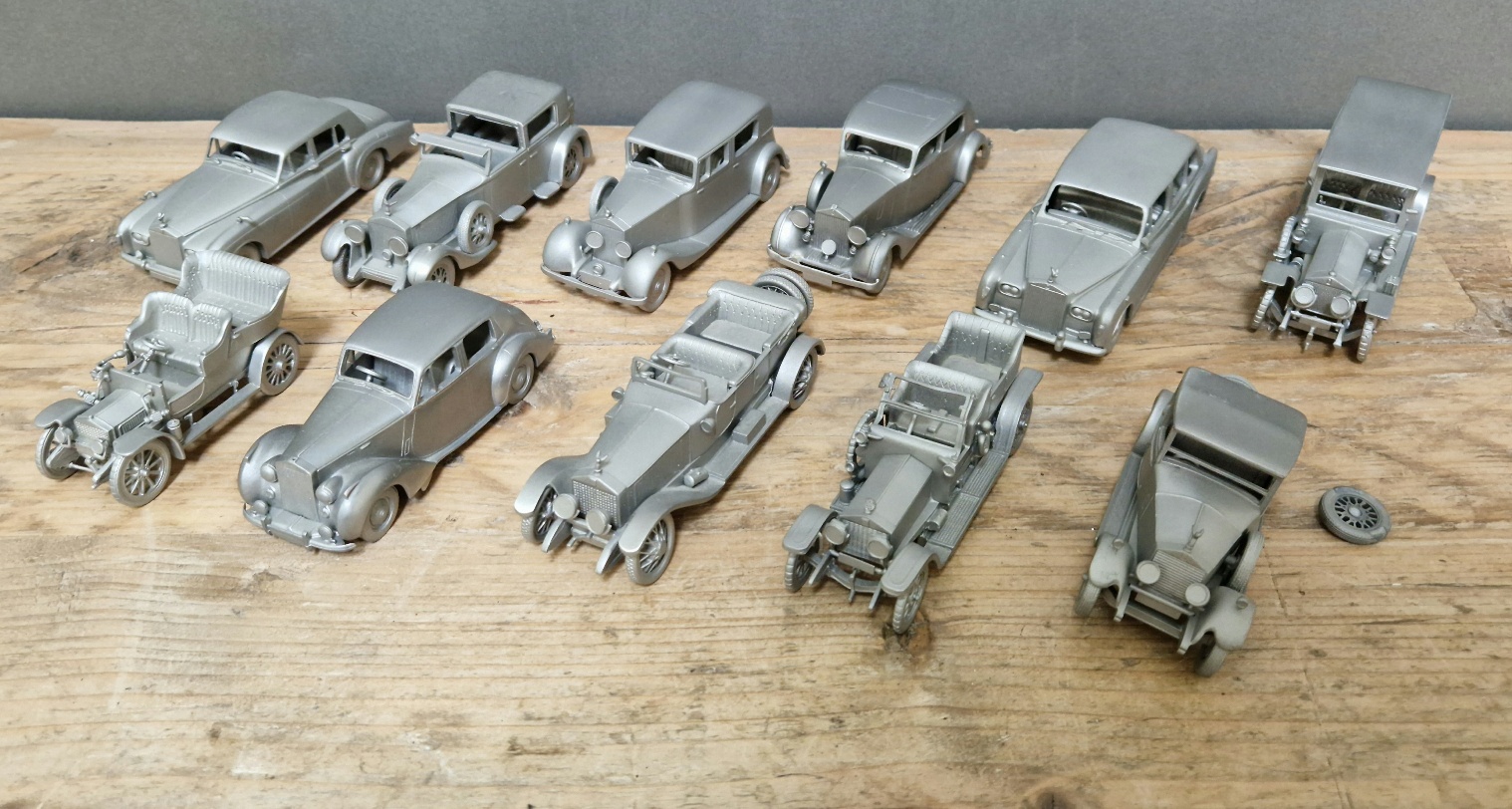 A collection of Danbury Mint Rolls Royce models.