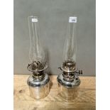 A pair of silver plated oil lamps, Hinks & Son fitting.