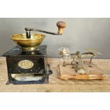 A set of postal scales with weights together with a coffee mill by A.Kenrick & Sons.