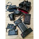 A box of vintage cameras to include a Soho Cadet folding camera, a Coronet Twelve-20 box camera, a