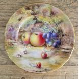A Royal Worcester plate, 16cm diameter, decorated with fruit to a mossy background.