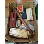 A box of collectables including pens and a truncheon etc.