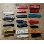 A collection of 15 folding penknives including Victorinox, Wenger, Sheffield makers....