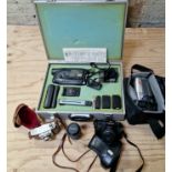 A vintage Panasonic R33 video camera with accessories in aluminium hard case together with a Canon
