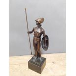 A bronze figure after Rudolf Kuchler, modelled as a Greek soldier on marble base, height 47cm.