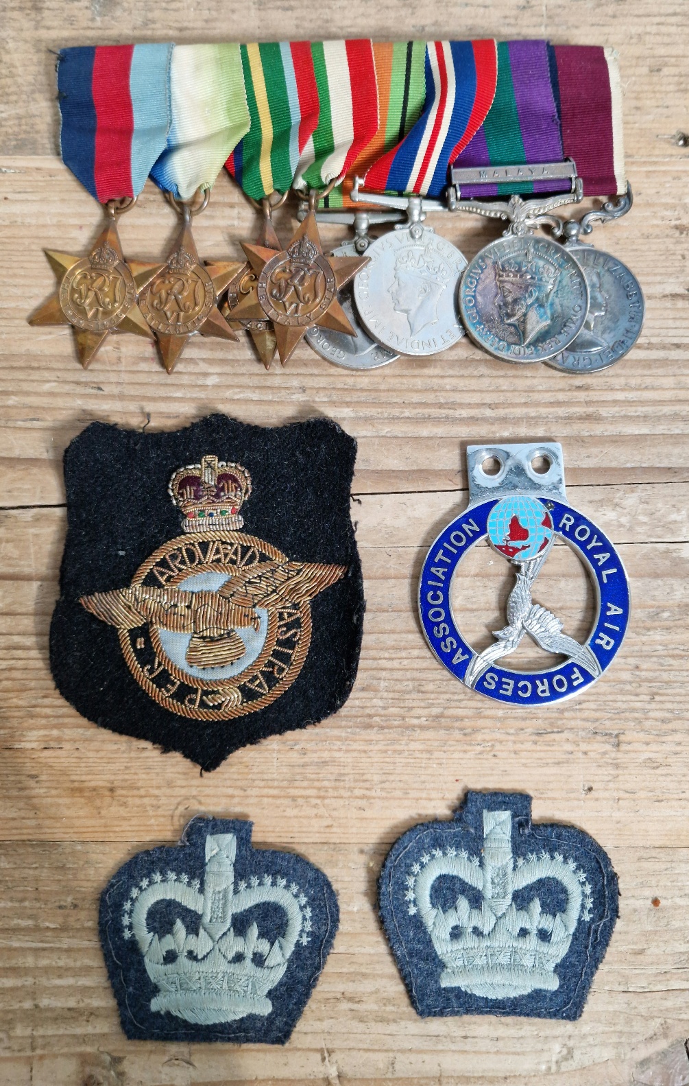 WWII and later group of eight, awarded to F Crook RAF with associated badges etc.