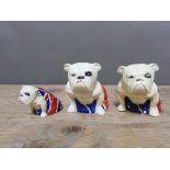 A set of three Royal Doulton Union Jack Bulldog figures. Condition - small dog with hairline