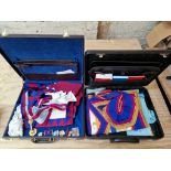 Two cases of Masonic regalia to include jewels, a silver example, collars, etc.