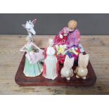 A tray of assorted pottery comprising two Royal Doulton figures, a Coalport figure, two Sylvac