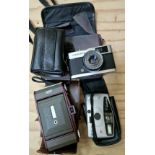 A 1950s - 1960 vintage folding Ross Ensign Selfix Snapper camera in case, a Olympus Trip 35 camera
