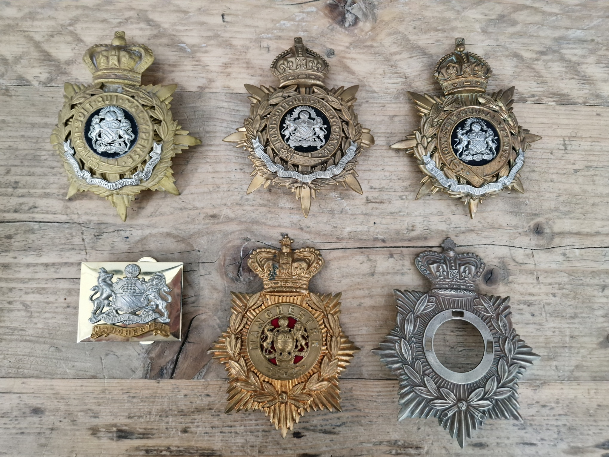 A group of eleven helmet / shako plates to include a Victorian era 96th Regiment of Foot, a - Image 2 of 5