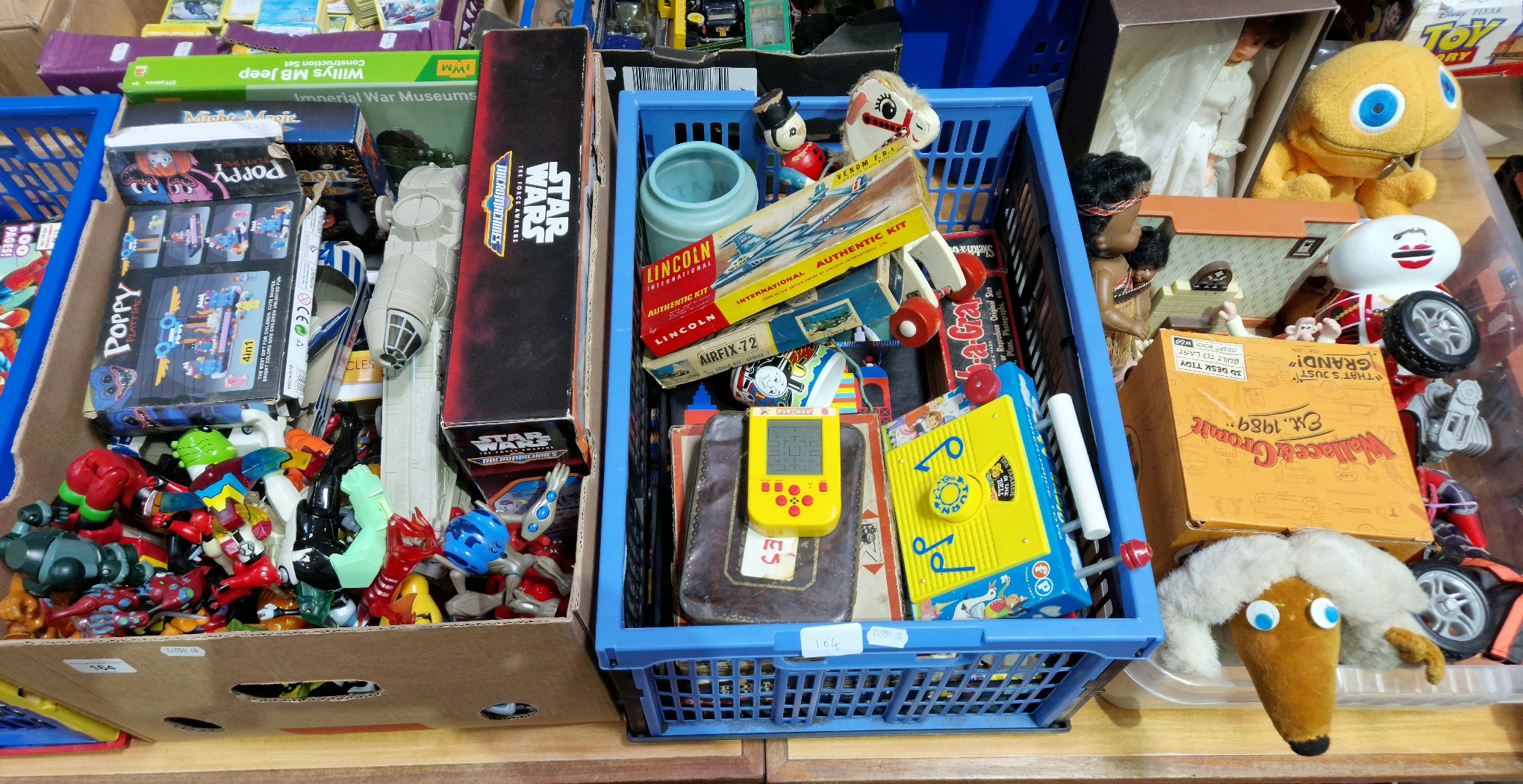 Three boxes of assorted toys to include Star Wars micro machine, boxed model motorcycles, marbles,