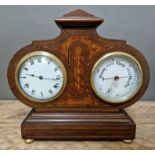 A French inlaid mahogany mantle clock with barometer.