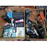 Two boxes of cameras and accessories to include a vintage Vest Pocket Kodak model B folding