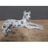 An Italian porcelain dog, marked 'Alano' and number 555, length 68cm.