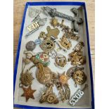 A tray of military badges and related items, etc.