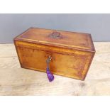 A 19th century satin wood cross banded mahogany tea caddy, interior with two containers and