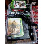 An Xbox 360 & an Xbox with various Xbox/Xboxone & Xbox360 games.