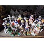 A collection of Staffordshire figures.