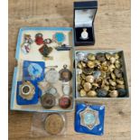 Two trays of various badges and buttons to include Preston Schools, St. John Ambulance, H.M. Armed