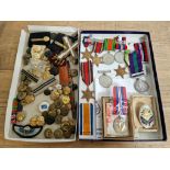 A tray of various medals to include four Star medals ( two The Burma Star, one The 1939- 1945 Star