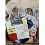 A small box of assorted 45s