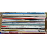 A box of assorted lps to include beatles red & Blue etc.