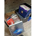 A box of 45rpm singles, various eras, includes T Rex, and a small collection of 12" singles and LPs