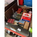 A box of assorted games including bone and ebony dominoes, together with two razors.