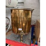 A brass and copper coal bucket.