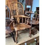 A 19th century elm Windsor chair.