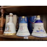 Three full Bells Whisky commemorative decanters - HM Queen Elizabeth II 60th Birthday 1986; Queen