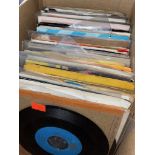 A box of 7" singles.