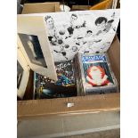 A box of sport memorabilia including photographs and Oldham Athletic FC programmes etc