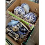 Two boxes of blue and white ceramics