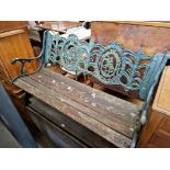 A cast iron garden bench.