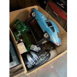 A box of model vehicles including Burago E type Jaguar (no box) and a boxed Burago Jaguar SS