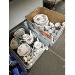 Two boxes of dinnerware