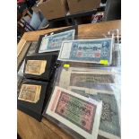 A collection of assorted German banknotes