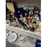 A large collection of Wade figures - some duplicates - including Boots van, Betty Boop, Garfield,