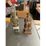 A spelter ecclesiastical figure and an Oriental figure.